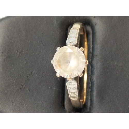 21 - 9ct Gold and Cubic Zirconia Stone set Ring. Size M 1.8 Grams.