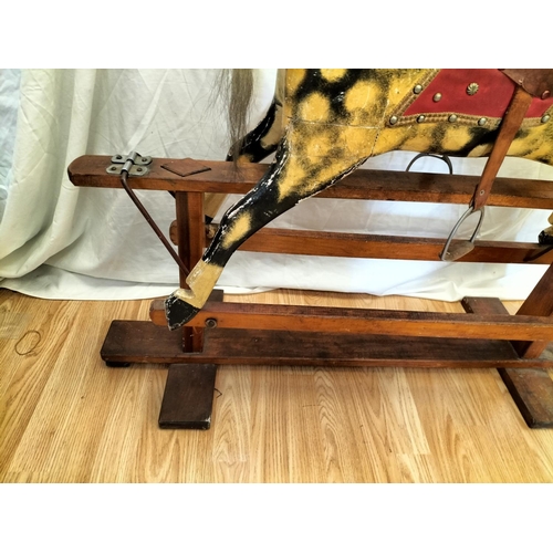 148 - Dapple Rocking Horse. Requires Attention. 90cm High, 107cm x 36cm. Collection Only.