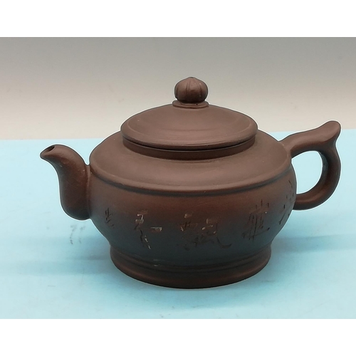 22 - Chinese Yixing Teapot Decorated to the Body and Signed to Base. 10cm High x 16cm.