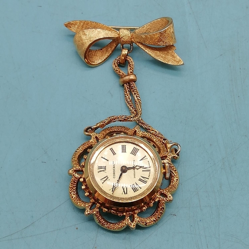 312 - Vintage Corocraft Ladies Suspended Brooch/Watch with Enamel Floral Display. Requires Attention.