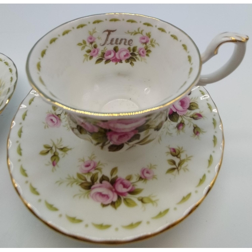 66 - Royal Albert Calendar Cups and Saucers (2) for January and June.