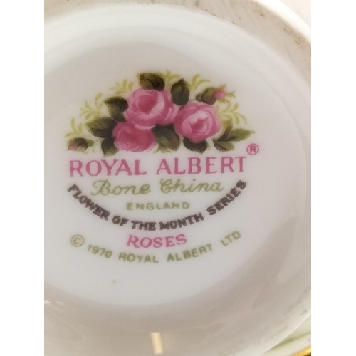 66 - Royal Albert Calendar Cups and Saucers (2) for January and June.