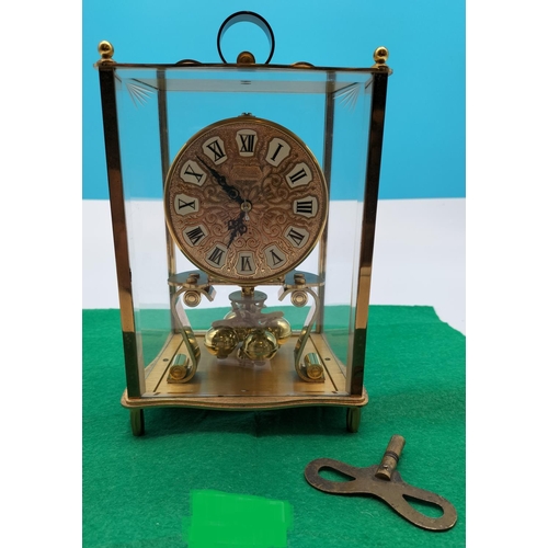 84 - Kundo West German Brass and Glass Cased Mantle Clock. W/O with Key. 23cm High, 14cm x 11cm.