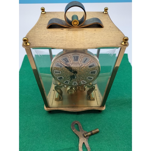 84 - Kundo West German Brass and Glass Cased Mantle Clock. W/O with Key. 23cm High, 14cm x 11cm.