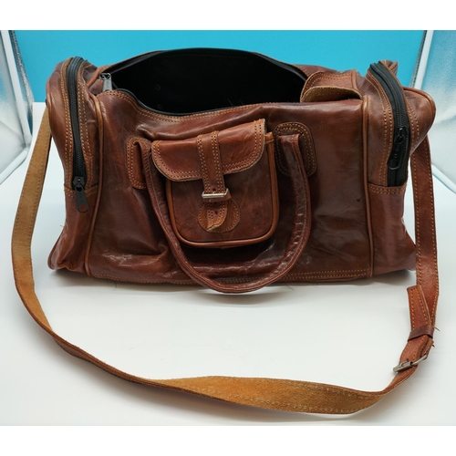 85 - Brown Leather Overnight Bag. 24cm High, 46cm x 20cm.