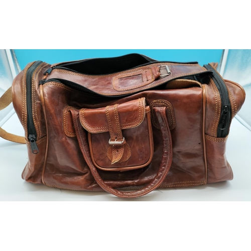 85 - Brown Leather Overnight Bag. 24cm High, 46cm x 20cm.