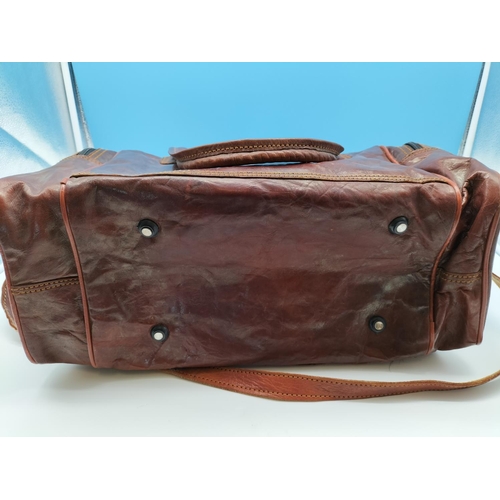 85 - Brown Leather Overnight Bag. 24cm High, 46cm x 20cm.