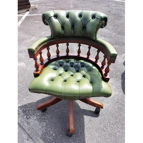 115 - Chesterfield Green Leather Captains Chair. 86cm High, 61cm x 70cm. Seat Height 45cm. Arm Height 68cm... 