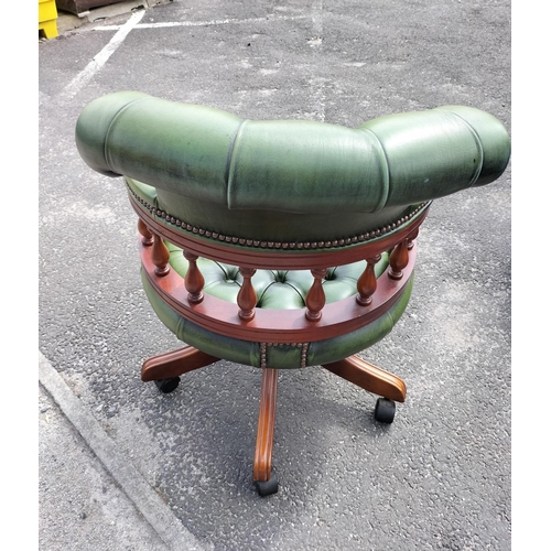 115 - Chesterfield Green Leather Captains Chair. 86cm High, 61cm x 70cm. Seat Height 45cm. Arm Height 68cm... 