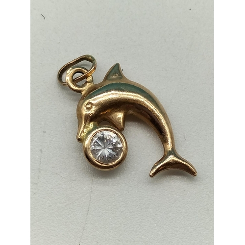 33 - 9ct Gold and Stone set 'Dolphin' Pendant. .78 Grams.