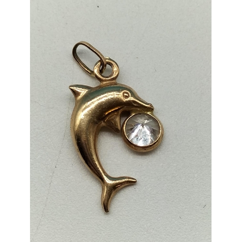 33 - 9ct Gold and Stone set 'Dolphin' Pendant. .78 Grams.