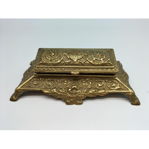 38 - Brass Inkwell (11cm High, 15cm x 14cm) plus Desk Stamp Box (5cm high, 9cm x 15cm).