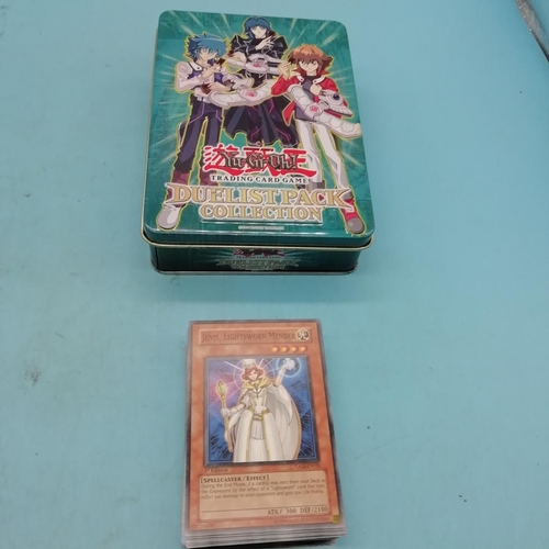 241 - 1996 Tin Box Containing Quantity of Yu-Gi-Oh Cards.