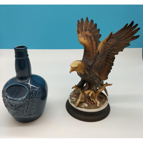 394 - Chivas Whisky Bottle plus 27cm Figure of an Eagle on Plinth. A/F Claw.