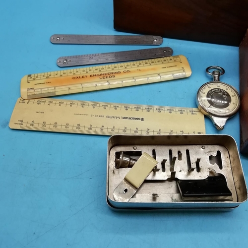 439 - Wooden Box containing Volt Meter, Rulers and other Instruments. Box measures 25cm x 22cm x 15cm.