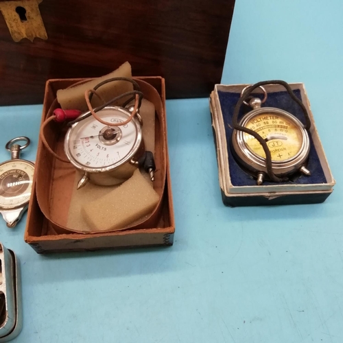 439 - Wooden Box containing Volt Meter, Rulers and other Instruments. Box measures 25cm x 22cm x 15cm.