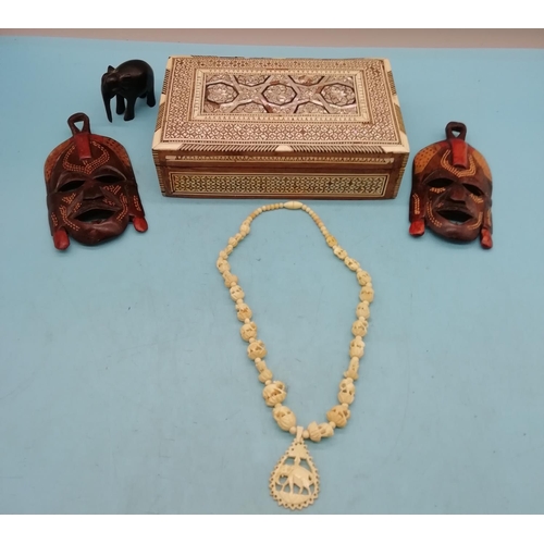 442 - Inlaid Mother of Pearl Box, Wooden Masks (2), Elephant Figure and Necklace.