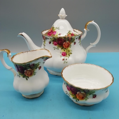 473 - Royal Albert Teapot, Sugar and Cream Jug in the 'Old Country Roses' Pattern. First Quality. Early Ba... 