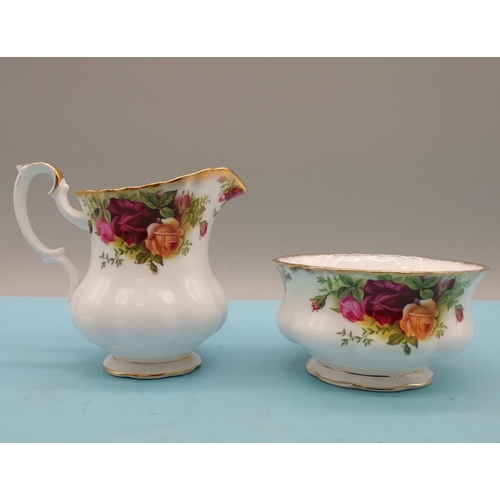 473 - Royal Albert Teapot, Sugar and Cream Jug in the 'Old Country Roses' Pattern. First Quality. Early Ba... 