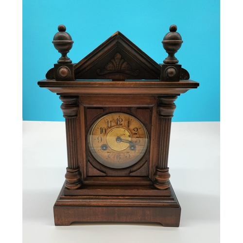 55 - Oak Cased Mantle Clock W/O. 37cm high, 25cm x 16cm.