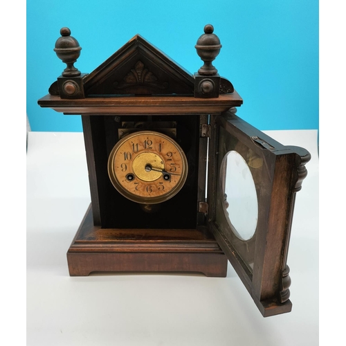 55 - Oak Cased Mantle Clock W/O. 37cm high, 25cm x 16cm.