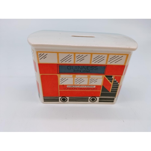 730 - Carltonware Guinness London Transport Money Box. 15cm x 10cm.