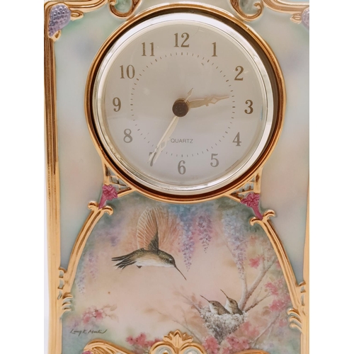 11 - Bradford Exchange 'Garden Whispers' Mantle Clock. 24cm High x 13cm.