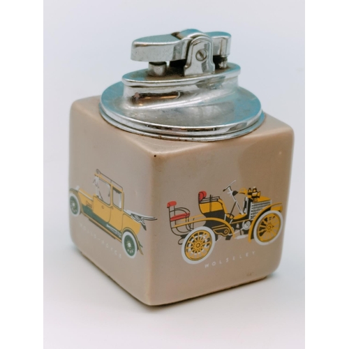 123 - Table Lighters (2) - Ceramic Car Design and Vintage Japanese Pewter Pipe Design.