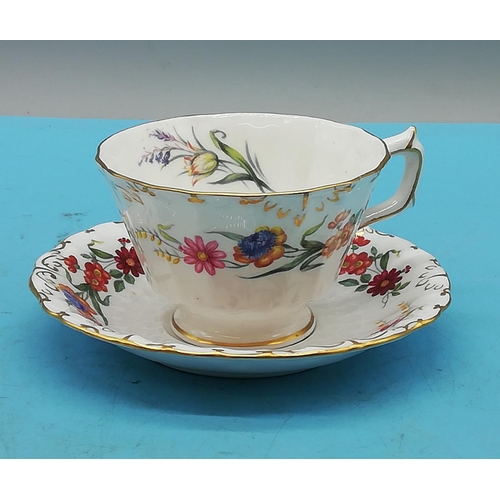 193 - Royal Crown Derby Cup and Saucer in the 'Chatsworth' Pattern.