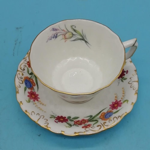 193 - Royal Crown Derby Cup and Saucer in the 'Chatsworth' Pattern.