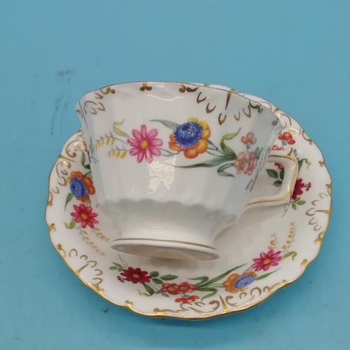 193 - Royal Crown Derby Cup and Saucer in the 'Chatsworth' Pattern.