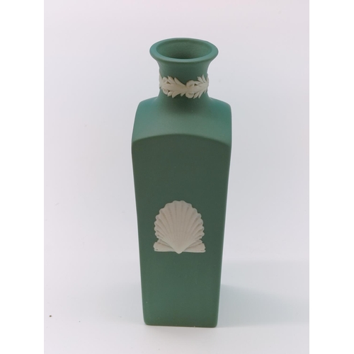 449 - Wedgwood Teal Jasper 14cm Bottle Vase with Shell Motifs.