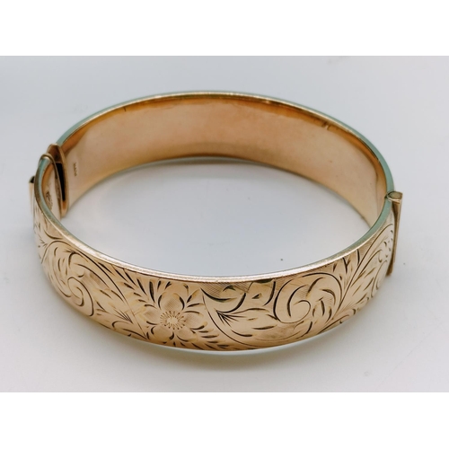 519 - 9ct Gold Metal Core Bangle. 31.7 Grams.