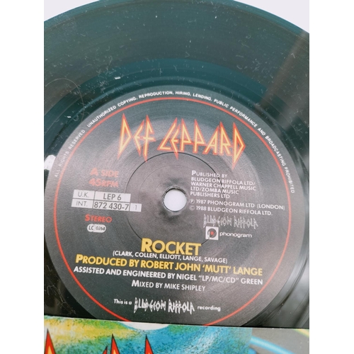 59 - Collection of Single 45rpm Records to include Def Leppard, Poison and Van Halen.