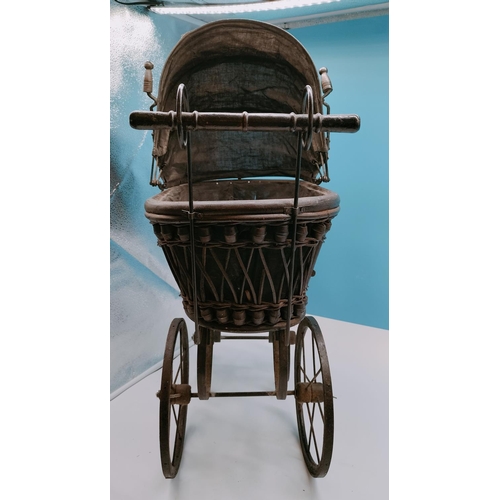 15 - Victorian Style Doll's Pram. Wicker and Wood Frame with Metal Chassis. 60cm High, 50cm x 23cm. Colle... 