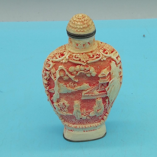 251 - Chinese Carved Bone Snuff Bottle. 7.5cm Tall. Character Mark to base.