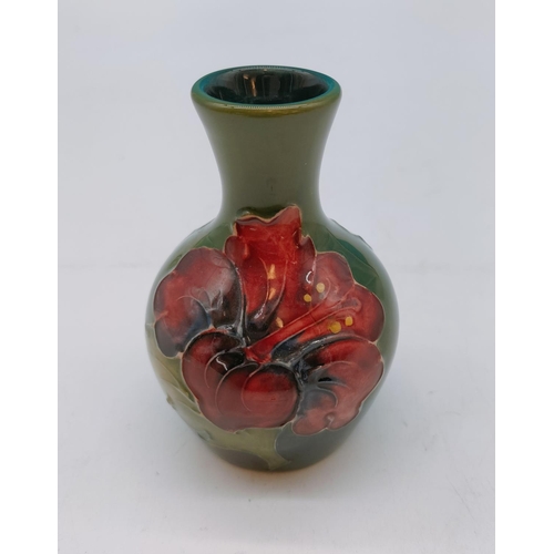 5 - Moorcroft 10cm Bud Vase in Hibiscus on Green Background.