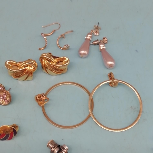 575 - 17 Pairs of Fashion Earrings - Pierced and Clipped.