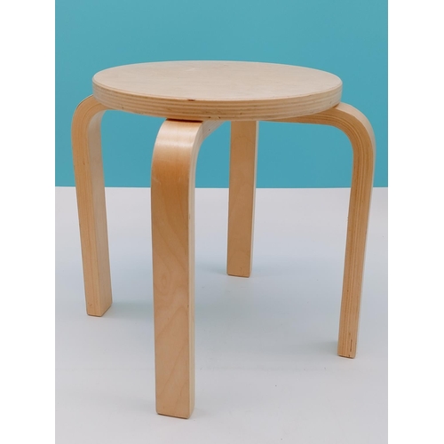 576 - Childs Light Wood Stool. 30cm High, Diameter to include Legs 34cm.