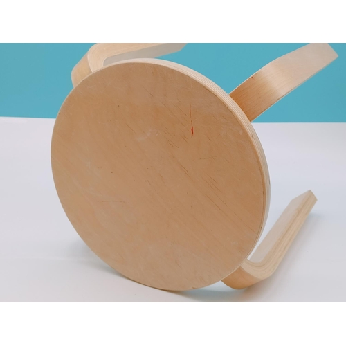 576 - Childs Light Wood Stool. 30cm High, Diameter to include Legs 34cm.