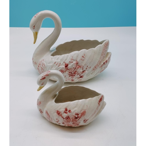 596 - Ceramic Swan Figures (2). Made in Portugal. 22cm High x 27cm.