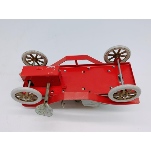604 - Vintage Tin Toy Car with Key. 18cm Long.