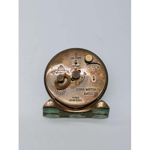 663 - Vintage Swiss Cyma Amic Brass Clock W/O. 6cm x 6cm.