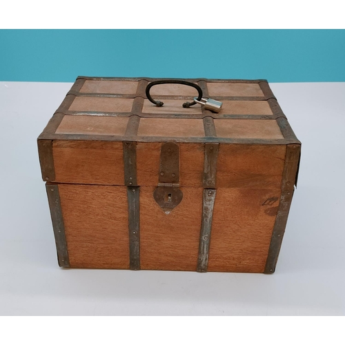 723 - Metal Banded Wooden Box with Handle. 17cm High, 26cm x 20cm.