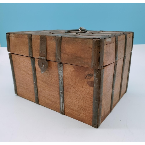 723 - Metal Banded Wooden Box with Handle. 17cm High, 26cm x 20cm.