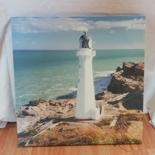 724 - Canvas Print of a Lighthouse. 50cm x 50cm. Collection Only.