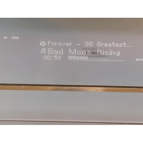 100 - ONKYO CD/HDD Receiver BR-925 UKD. W/O.