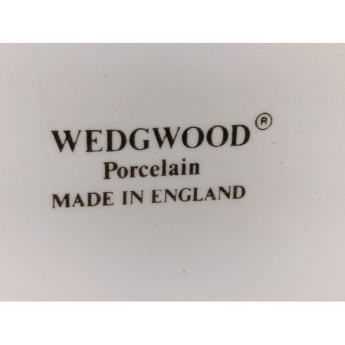 141 - Wedgwood Porcelain 9cm Figure of a Victorian Boy Playing Marbles.