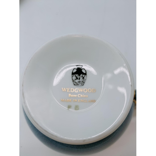 70 - Wedgwood 20 Piece Part Tea Set in a Blue and Gold Vine Design.