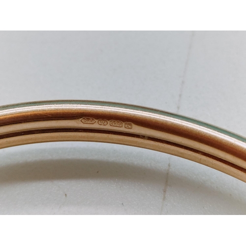 84 - 2 x 9ct Gold Torque Bangles. 15.6 Grams.